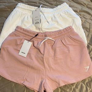 2 medium gymshark shorts (pink and white)
